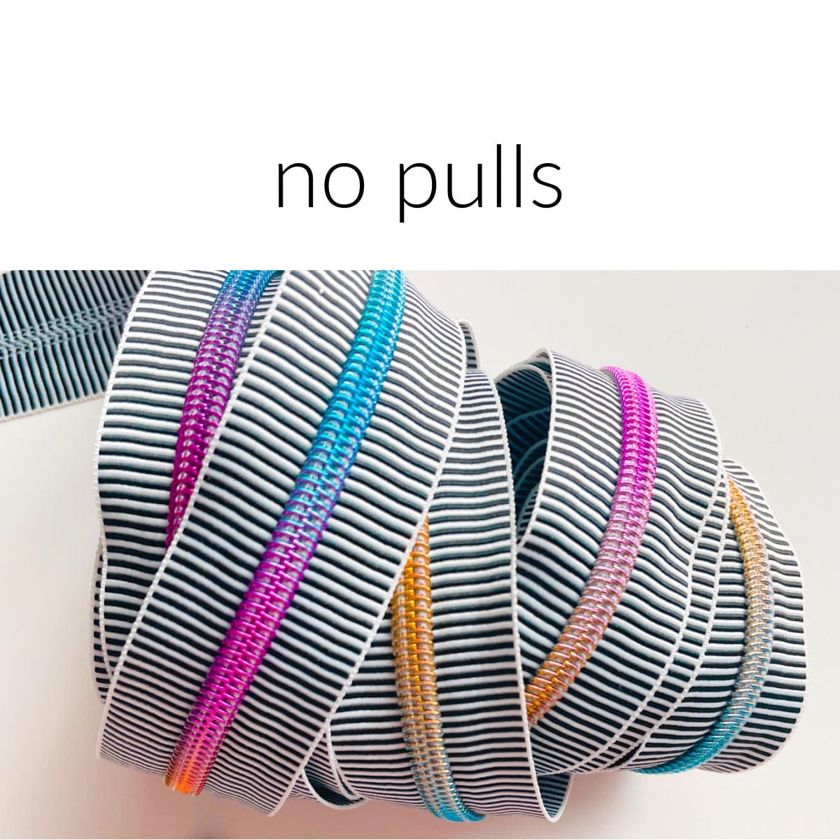 Rainbow zipper tape with striped fabric, no pulls