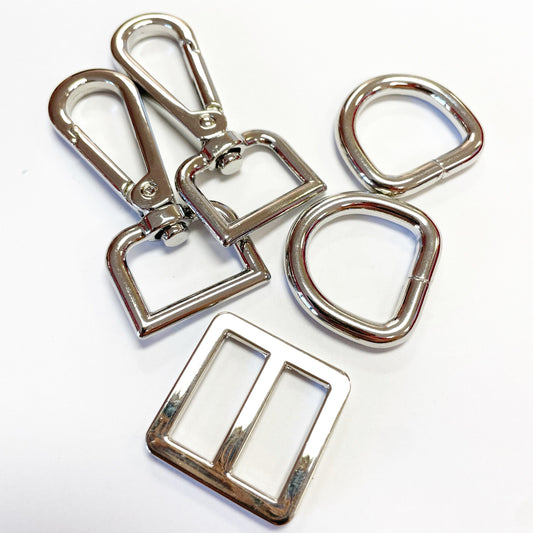 Silver metal hardware pieces.