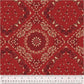 Traditional bandana-style quilt backing fabric featuring a large, intricate central mandala emblem enclosed in a diamond trellis pattern. The design includes classic paisley motifs, small stars, and floral elements in cream and dark burgundy-red over a rich crimson red background.