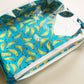 Clear cosmetic bag with banana print.