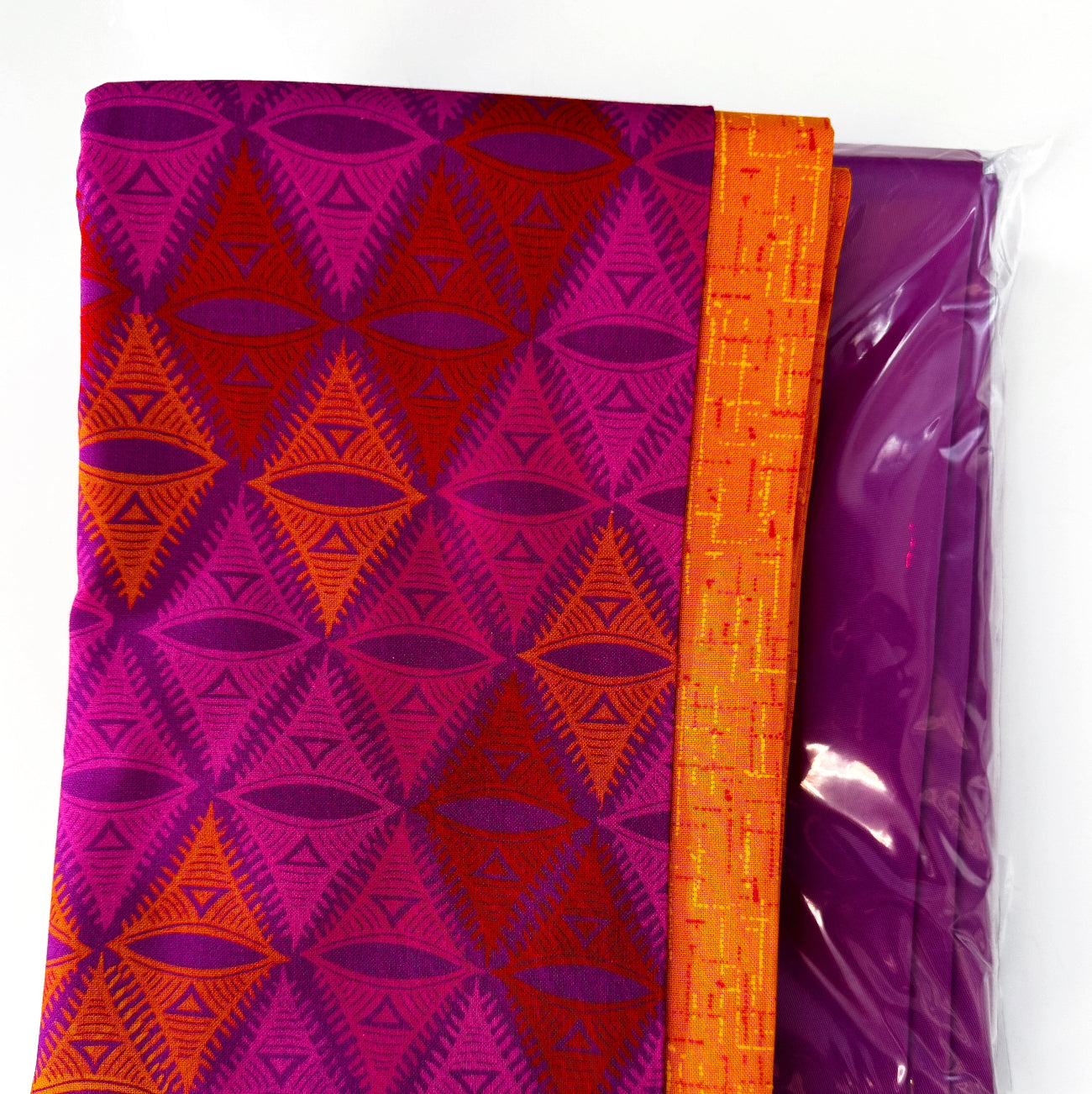 Two yards of premium cotton fabric paired with a pack of bonded nylon thread, perfect for bag making, quilting, and sewing projects.