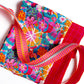 Vibrant sewing kit with Este MacLeod Star Multi fabric, Ruby Star Society red grid plaid, and pink and orange striped zipper tape by SewHungryHippie.