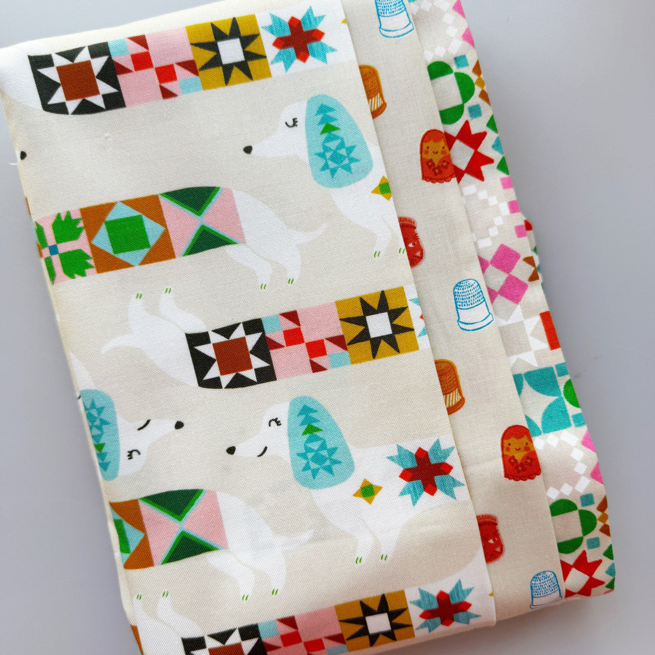 3-yard Ruby Star Society cotton fabric bundle featuring colorful quilt-inspired geometric prints on a cream background