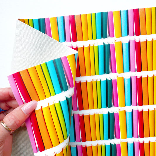 Books in rainbow colors custom vinyl