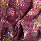 Floral patterned fabric with a prominent purple background