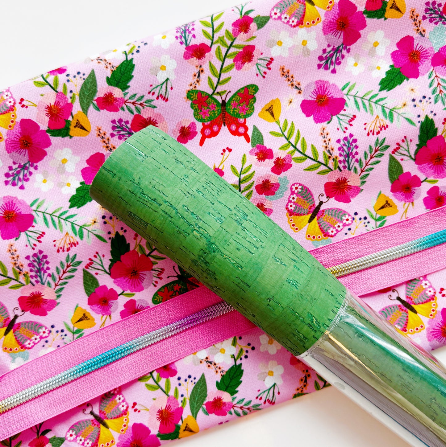 Pink floral butterfly cotton fabric with green cork roll and pink zipper tape bundle for bag making and sewing projects