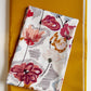 Retro mid-century modern abstract floral cotton fabric with mauve pink and mustard yellow flowers, paired with a solid mustard yellow canvas base fabric for quilting and bag making.