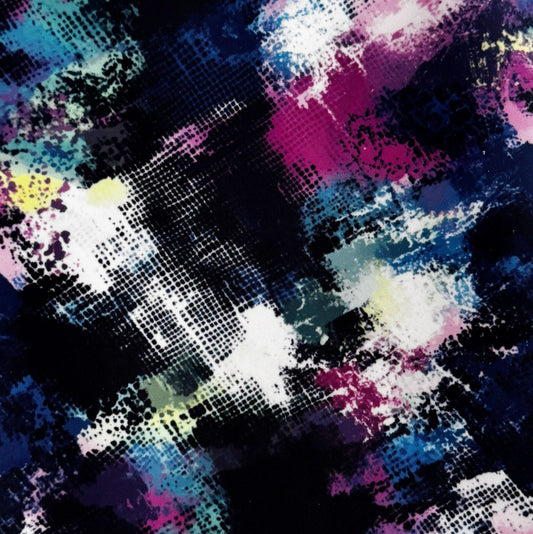 Abstract multicolor pattern with black, white, blue, pink, purple, and teal paint-like splashes and halftone dot textures filling the frame.