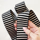 Black and white jacquard woven stripe webbing, 2-inch width, sold per yard. Strong decorative strap material for bag straps, purse handles, belts, and sewing projects.