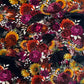 Gothic autumn floral fabric featuring black crows, sunflowers, and rich magenta roses by Robert Kaufman.
