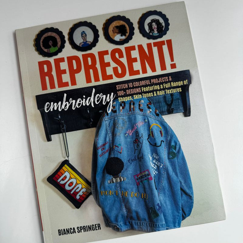 Book titled 'REPRESENT! embroidery' by Bianca Springer on a white background