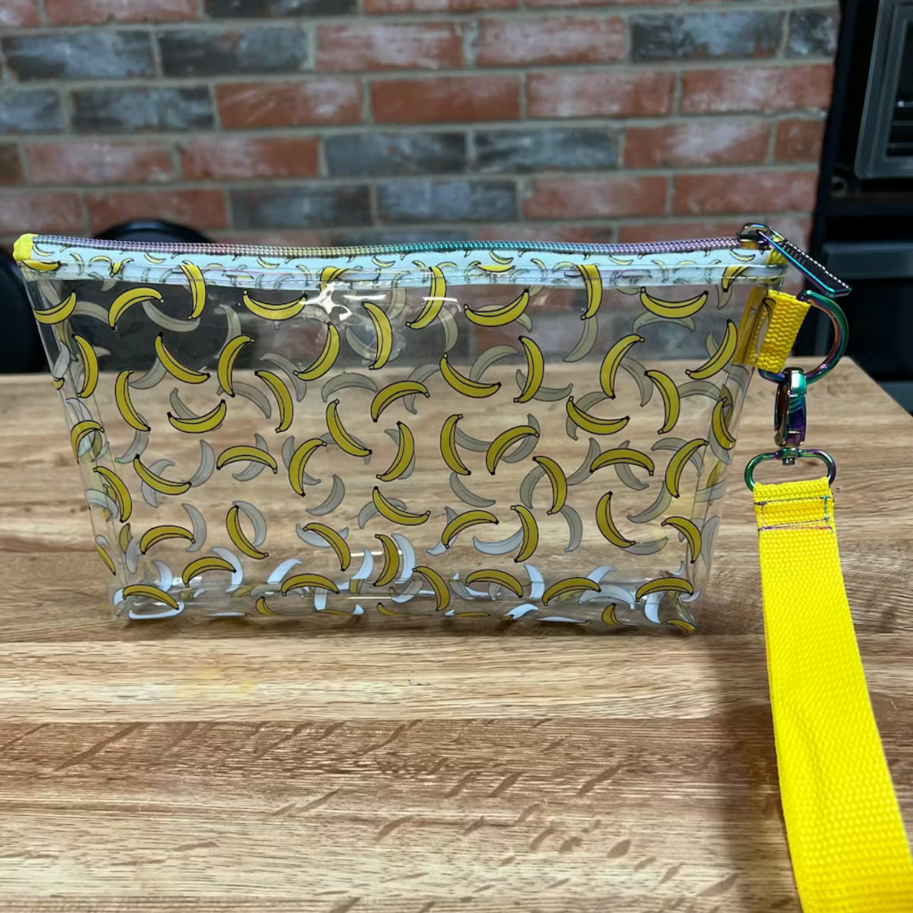 See-through clear vinyl printed with sweet little yellow bananas, featuring an ultra-smooth finish