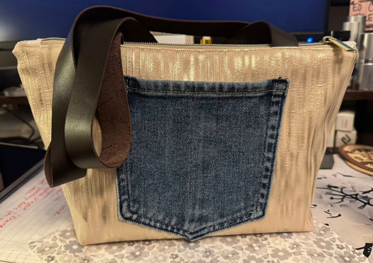 Handmade bag using Beige Gold Bands Vinyl with brown leather strap 