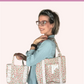 Natalie holding two bags with a white background and text about 'Berry Cute Bag' by Natalie Santini.