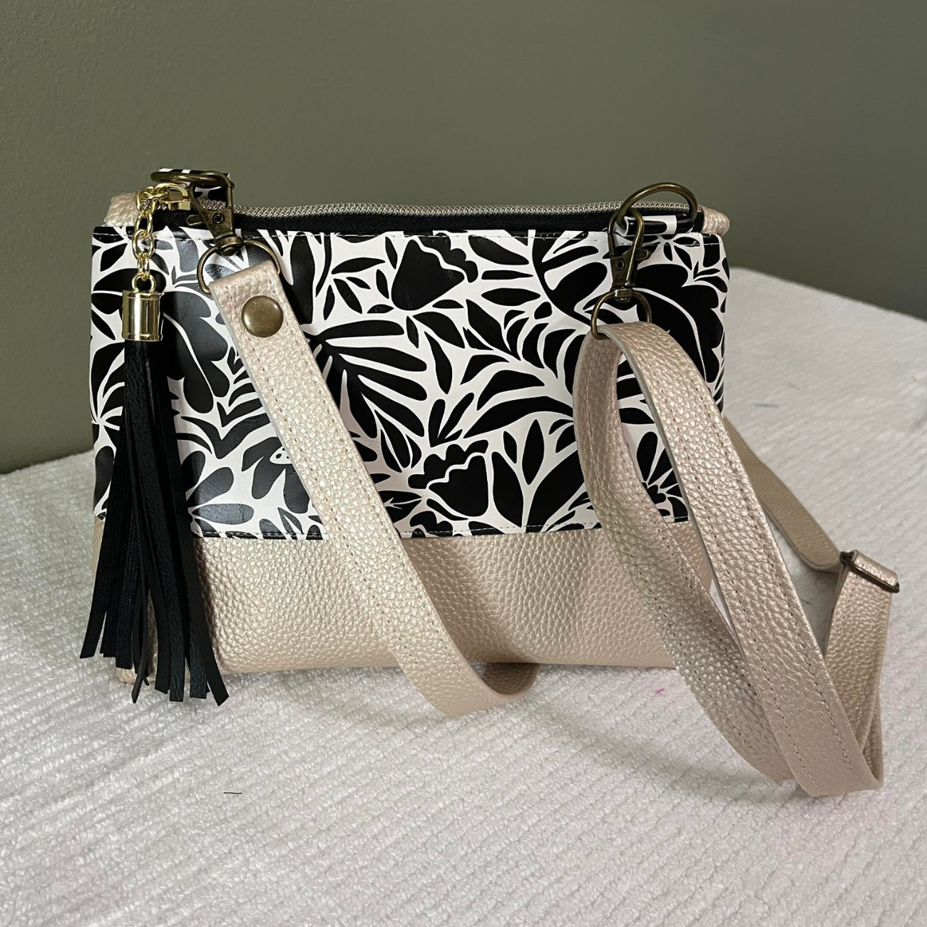 champagne vinyl and black cream vinyl mini pouch bag