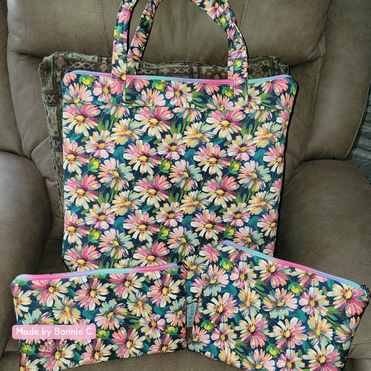 Handmade tote bag and zipper pouches in a pink and green floral canvas fabric