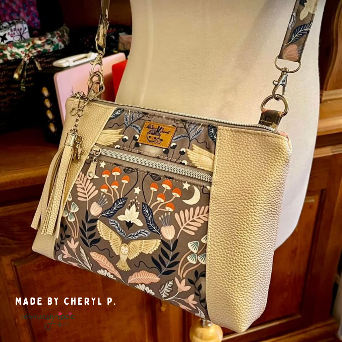 Champagne Moonglow vinyl crossbody bag with owl and botanical print pocket and tassel, made by Cheryl P.