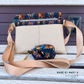 Champagne Moonglow vinyl crossbody bag with stained glass print top band and matching mini pouch, made by Mary K.