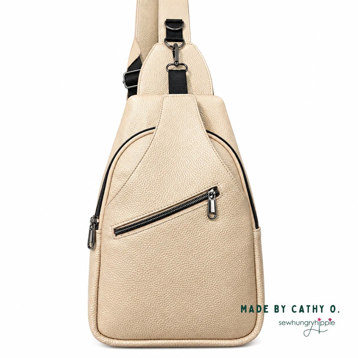 Champagne Moonglow vinyl sling bag with diagonal front zipper, made by Cathy O.