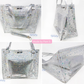Clear star glitter vinyl shoulder bag featuring tiny iridescent stars and silver crackle texture metallic handles.