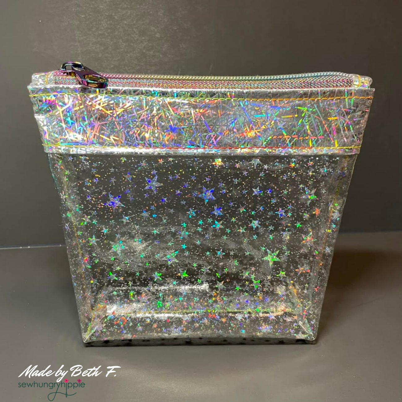 silver star pouch made with iridescent glitter star clear vinyl fabric