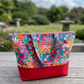 Colorful handmade bag making bundle including 2 yards of premium quilting cotton and 3 yards of matching striped continuous zipper tape.