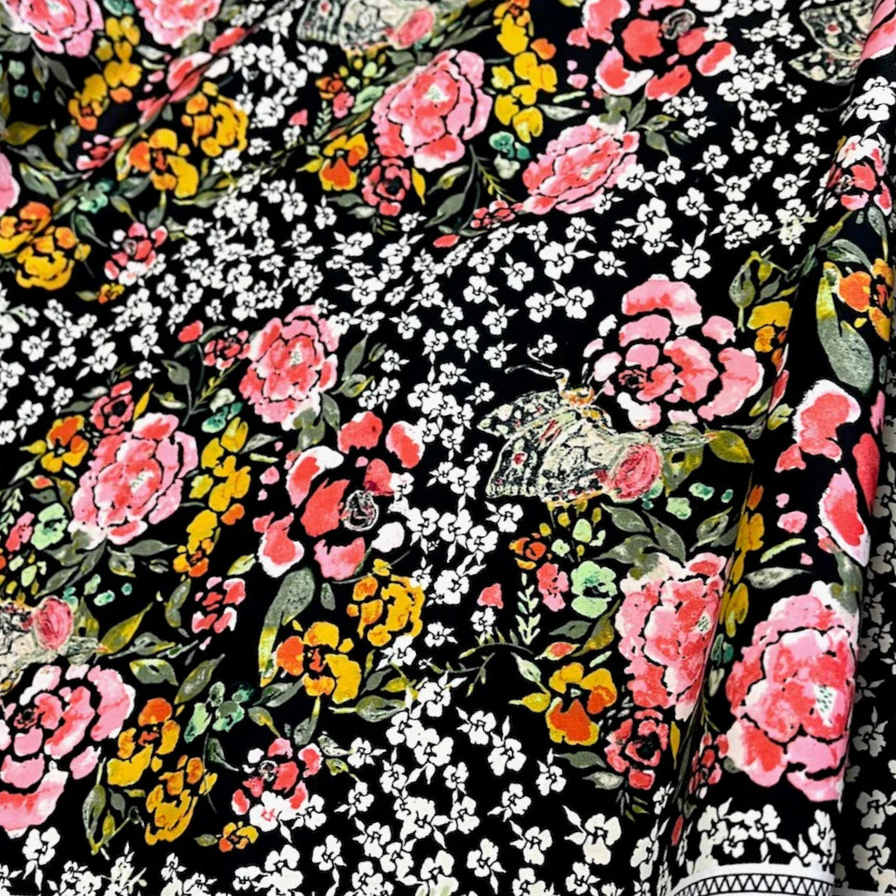 Closed up image of Robust Rayon fabric Eve Jardin by Art Gallery Fabrics, midnight garden botanical pattern for apparel and sewing projects.