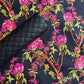 Art Gallery Fabrics Betty Ann’s Glamour floral cotton next to black diamond quilted pre-quilted vinyl