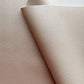 Close-up of beige leather texture