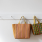 Fieldstone Tote Mini size handmade bag with zippered top – Noodlehead pattern hanged on a white wall