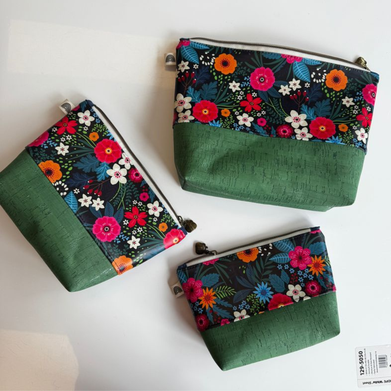 pouch making result with textured fern green cork fabric sheet rolled for sewing and DIY bags