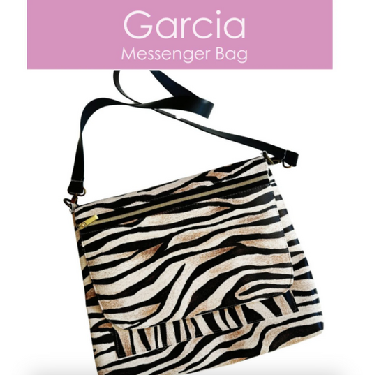 Zebra patterned messenger bag with 'Garcia Messenger Bag' text on a white background