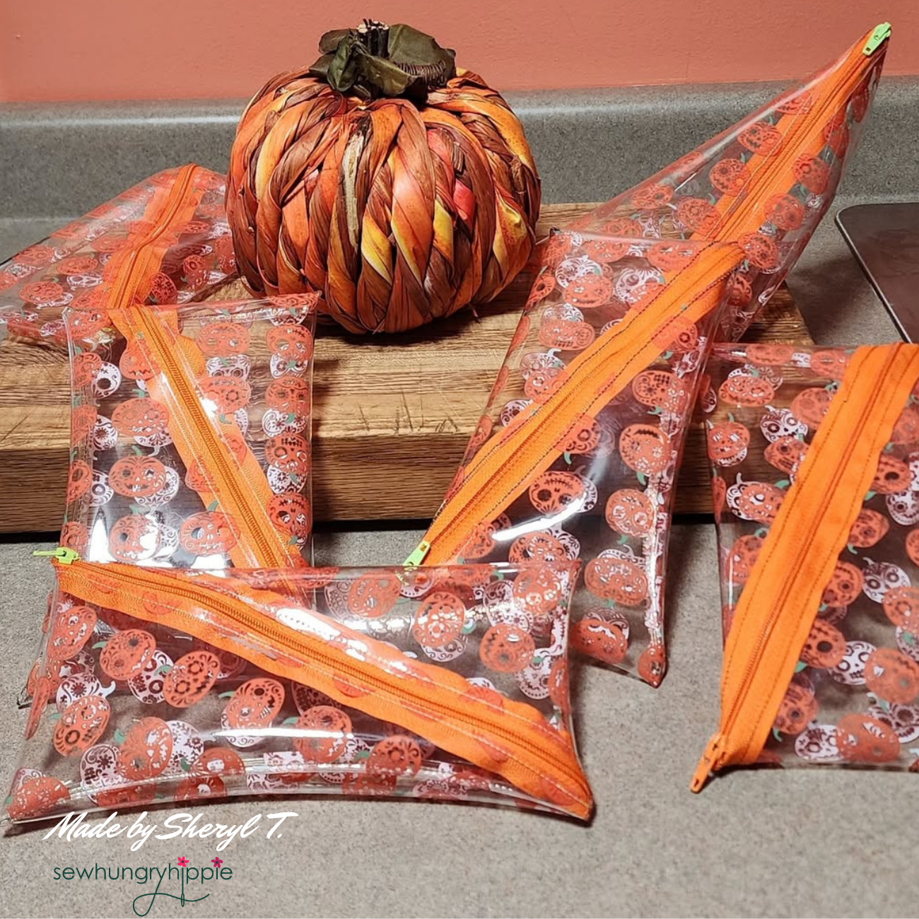 handmade zipper cases using Halloween pumpkin TPU vinyl for sewing projects