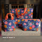 Set of totes and pouches in Happy Flowers navy canvas with striped handles