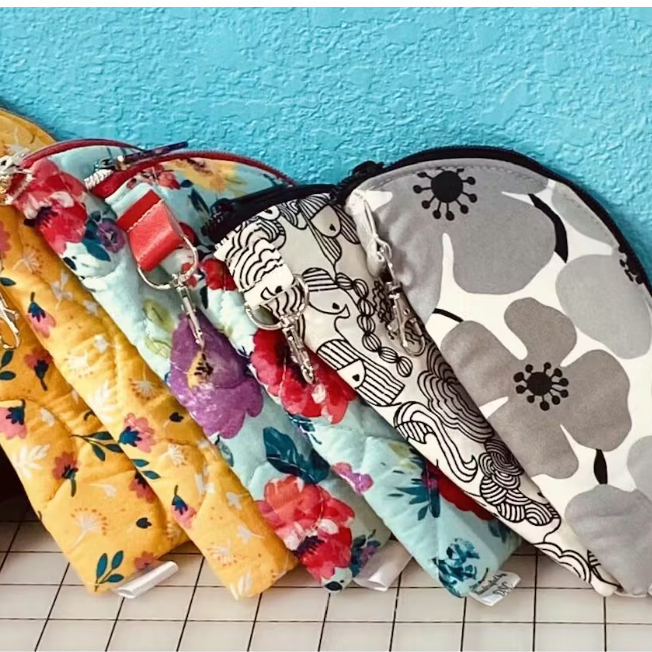 Hippie Specs Case PDF sewing pattern preview with full-size template pieces, cutting guides, and detailed construction steps for creating a fabric eyeglasses pouch.