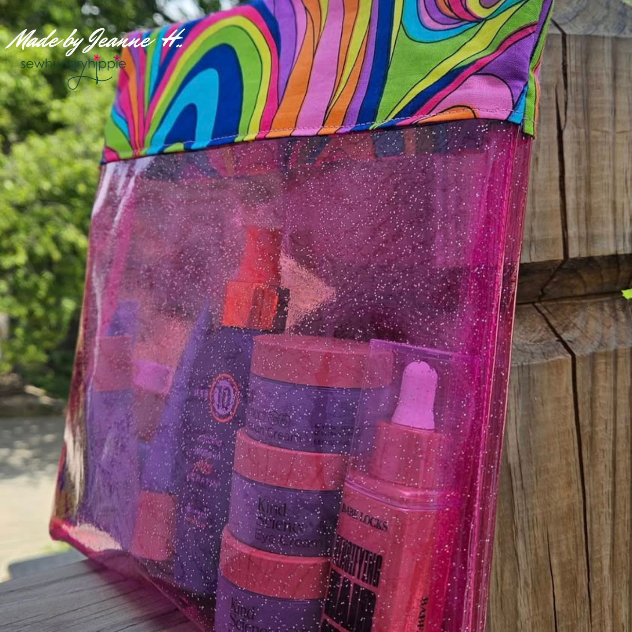 transparent hot pink glitter vinyl used for handmade zipper pouch bag project