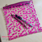 zipper pouch made with hot pink heart TPU vinyl fabric