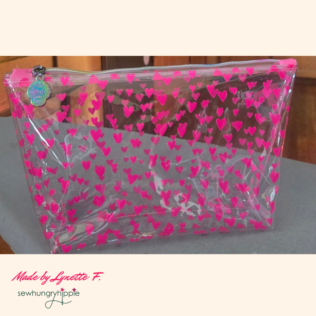 zipper pouch made with hot pink heart TPU vinyl fabric