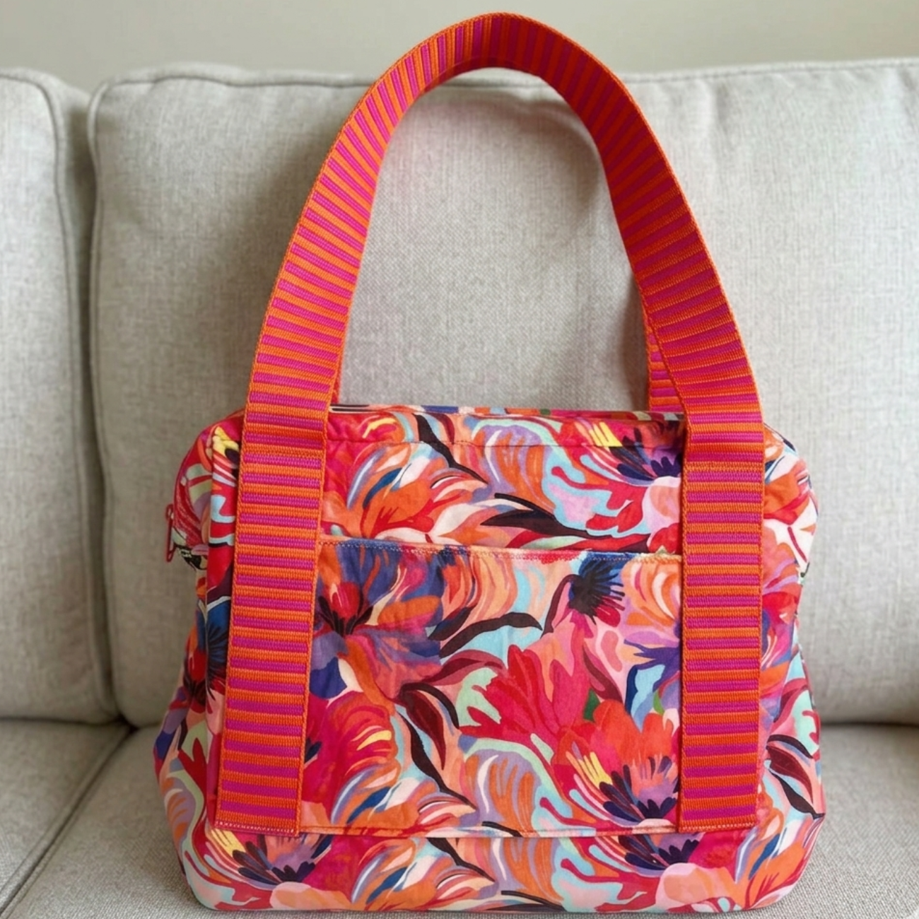 Mock up Joplin bag in 1-point-5-inch-bright-pink-orange-striped-bag-strap-webbing