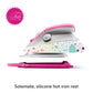 Mini Oliso Tula Pink iron with its pink Solemate silicone hot iron rest