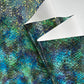 Teal and blue embossed serpent vinyl with a scale texture and gold foil accents. This shimmering faux leather is perfect for high-end bag making.
