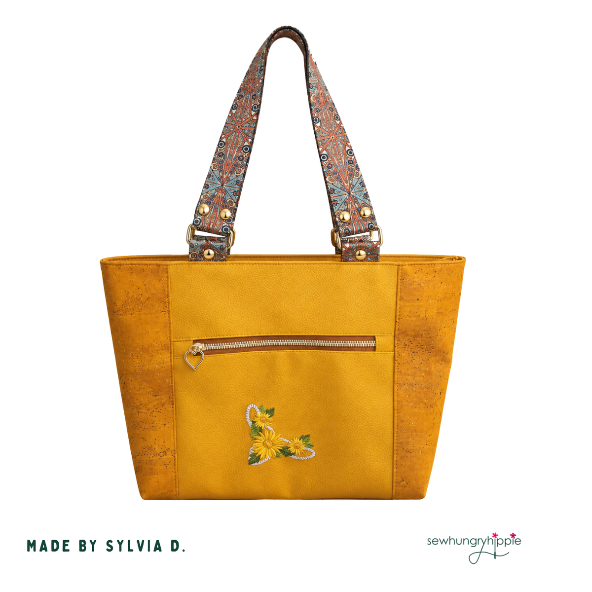 Mustard Moonglow vinyl tote with embroidered bird, front zipper pocket and paisley straps, made by Sylvia D.