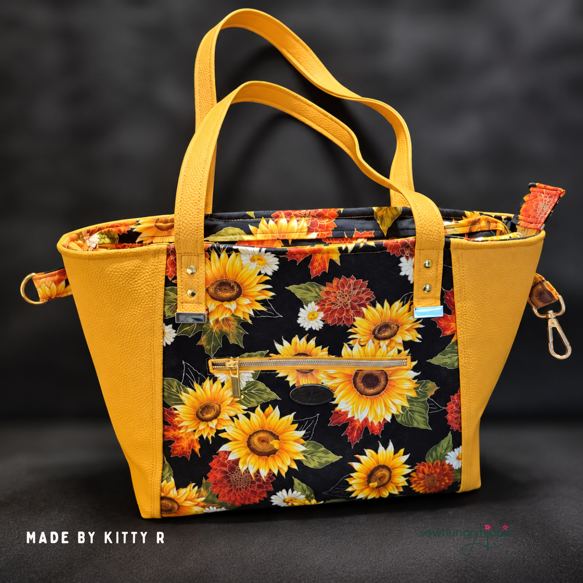 Handbag in sunflower print with mustard Moonglow vinyl sides and handles, made by Kitty R.