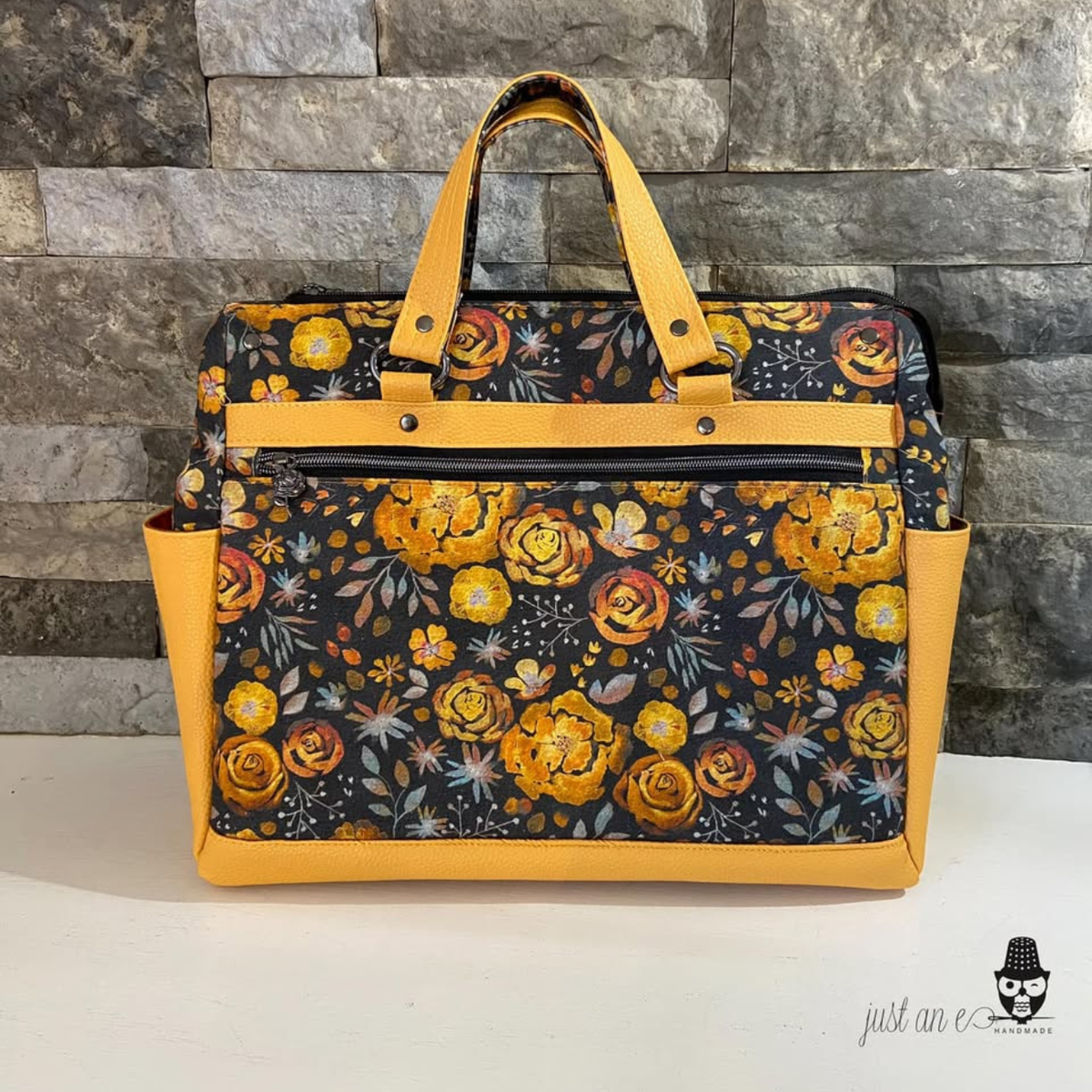 Doctor-style bag in dark floral rose print with mustard Moonglow vinyl sides and handles