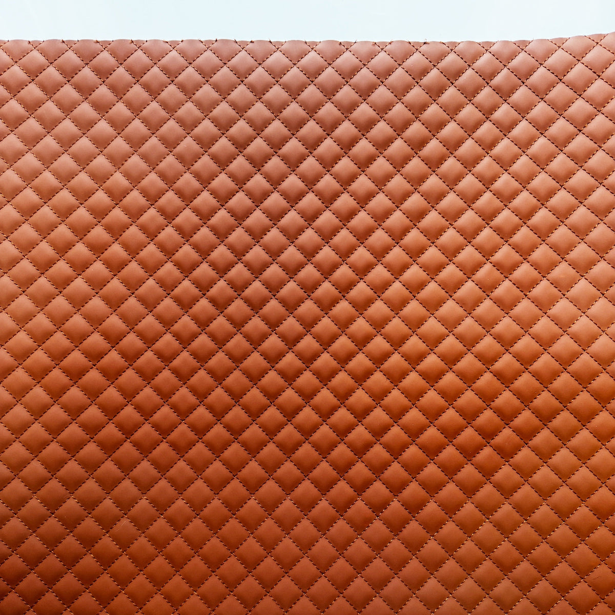 Brown quilted leather texture