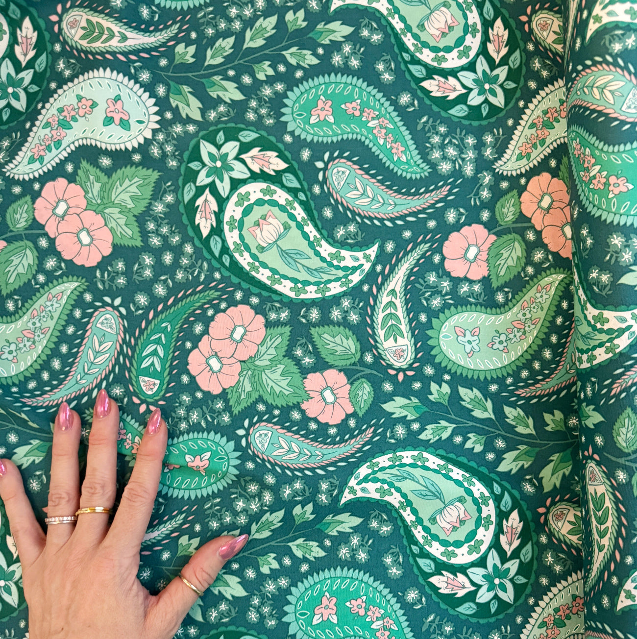 Cultivating Boteh fabric from the Flowerette collection by AGF Studio for Art Gallery Fabrics, green and pink floral paisley premium quilting cotton, SKU FWR-34888.