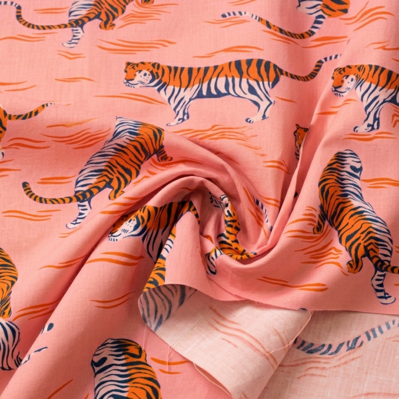 Retro tiger print cotton fabric in blush pink by Ruby Star Society, featuring orange and black striped tigers with abstract wave accents, ideal for quilting, apparel sewing, bag making, home décor, and modern craft projects.