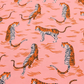 Retro tiger print cotton fabric in blush pink by Ruby Star Society, featuring orange and black striped tigers with abstract wave accents, ideal for quilting, apparel sewing, bag making, home décor, and modern craft projects.