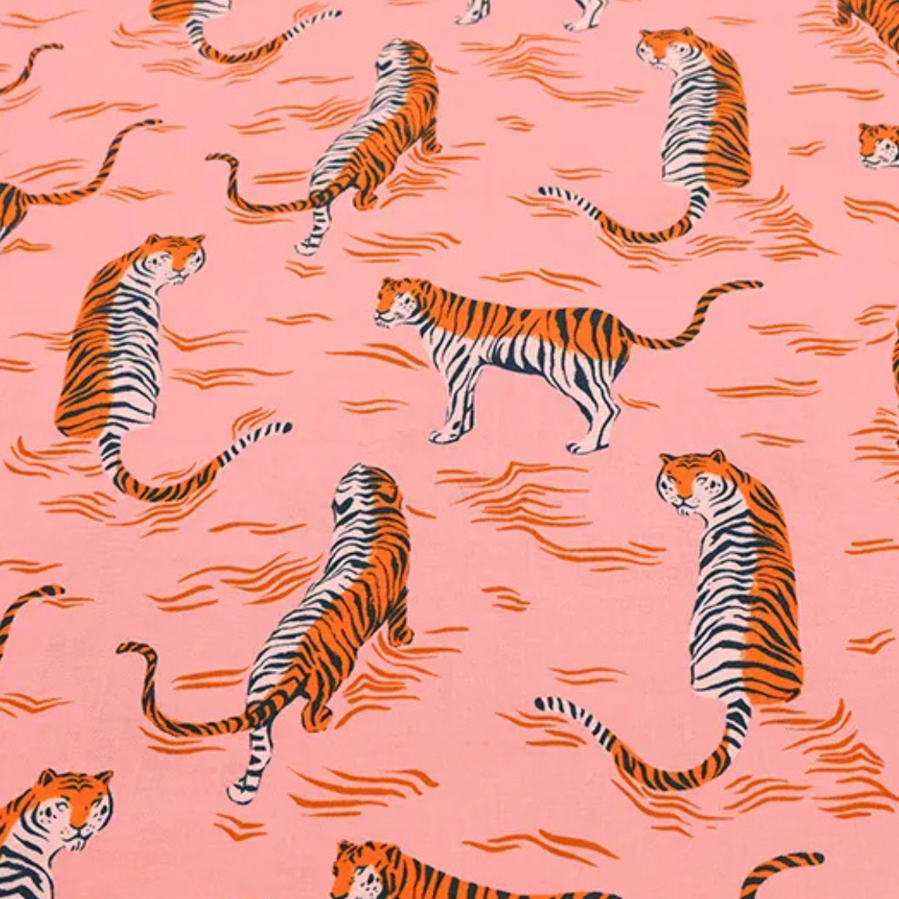 Retro tiger print cotton fabric in blush pink by Ruby Star Society, featuring orange and black striped tigers with abstract wave accents, ideal for quilting, apparel sewing, bag making, home décor, and modern craft projects.