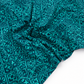 A vibrant teal and peacock blue quilting fabric from the Ruby Star Society Poolside Too collection. The design features a geometric "Architectural Blocks" pattern with hand-stamped style motifs including circles, petals, and squares in a grid layout.